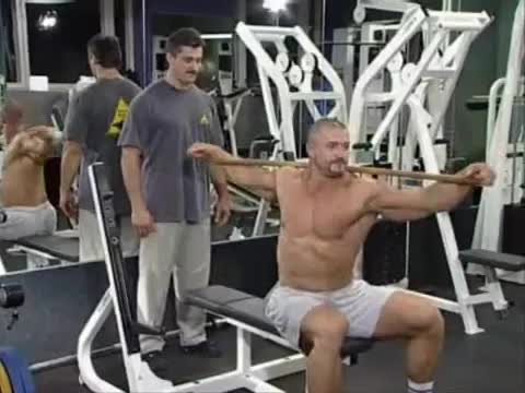 Вращение с палкой на плечах