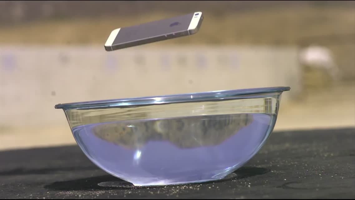iPhone 5s vs 50 cal - RatedRR Slow-Mo Torture Test