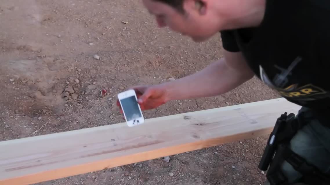 iPhone 4 vs Dragunov Sniper Rifle- Tech Assassin RatedRR