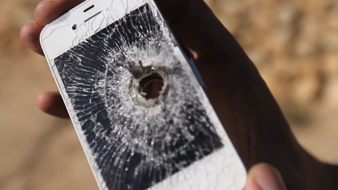 iPhone 4s vs 50 cal Armor Piercing Incendiary Explosive Rounds!- Tech Assassin